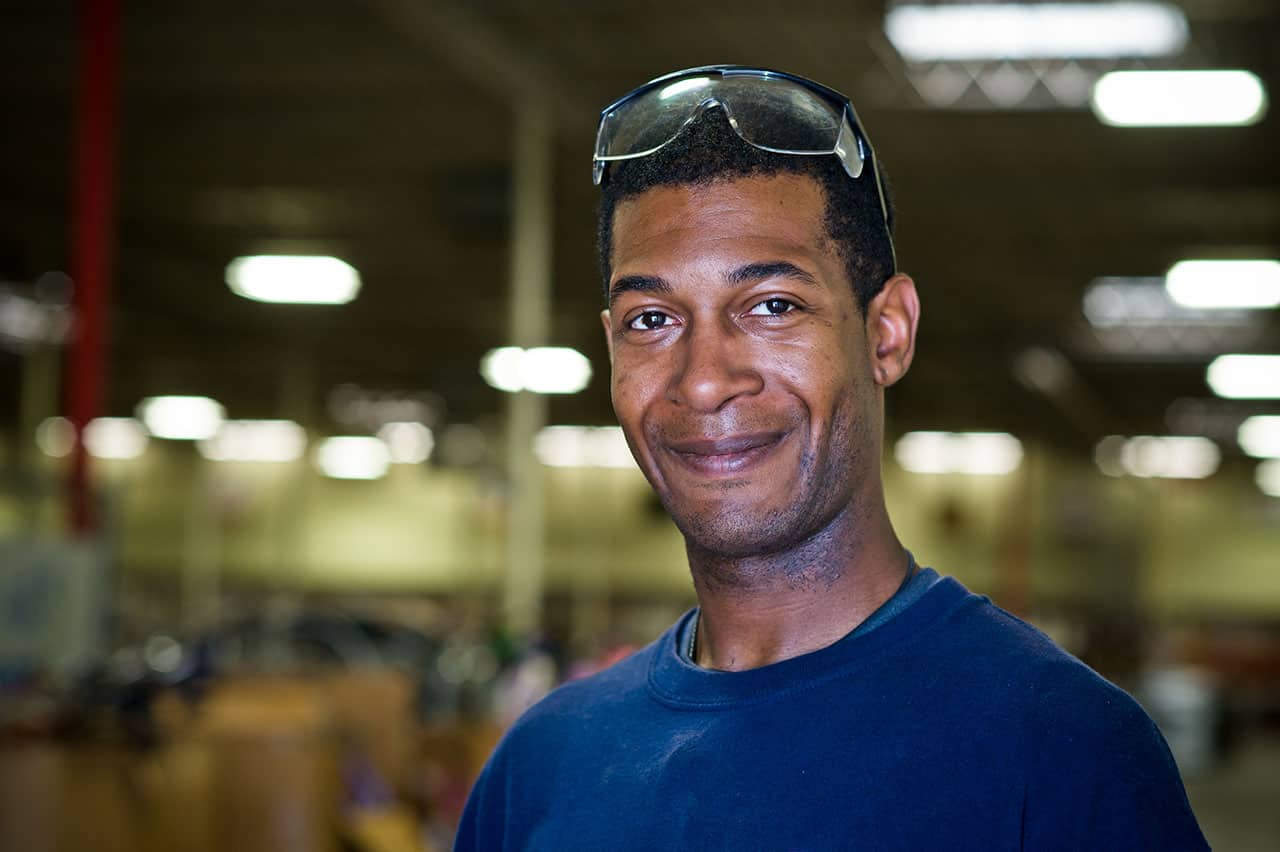 Smiling warehouse worker